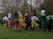 Here come the stilt walkers!